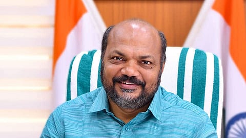 Image featuring P Rajeev wearing a blue shirt