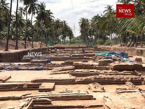Image featuring the aerial view of the Keeladi excavation site. Ancient brick walls could be seen inside a grand trench.