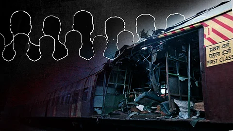 A stylised image - An image of a wrecked train and the outline of 12 heads in two rows