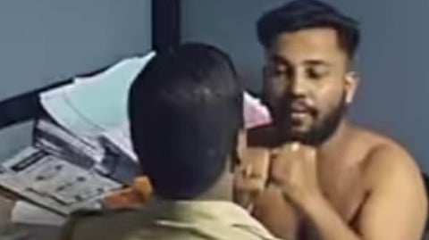 BS Sujith, a Youth Congress leader being assaulted by police