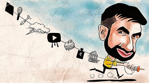 Caricature of Nikhil Kamath holding a kite spool and running, with a string connected to symbols of his journey — a microphone, YouTube logo, rupee sign, government building, and other icons representing finance, media, and power — against a textured beige background and blue sky.