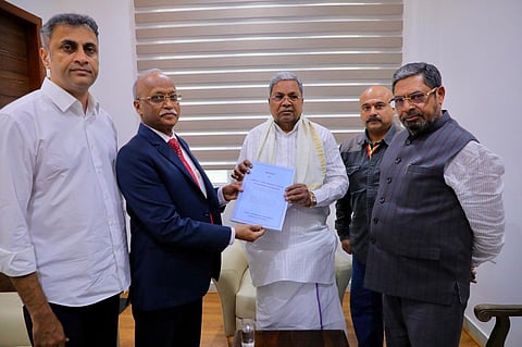 CM's Legal Adviser AS Ponnanna, Justice Michael D'Cunha, CM Siddaramaiah and CM's Political Secretary Nasser Ahmed