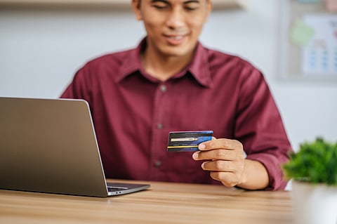 Can an FD-backed credit card help recover from a poor credit history?