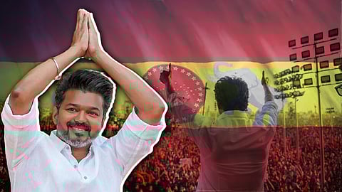 A man in a white shirt – actor Vijay – smiles and raises his hands in a greeting gesture in the foreground, with a large crowd and a red-and-yellow flag featuring a symbol in the background. Another view shows him from behind addressing the crowd at a rally.