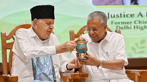 Image featuring Farooq Abdullah, Pinarayi Vijayan