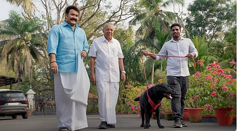 Actor Mohanlal and Chief Minister Pinarayi Vijayan take a stroll after the interview