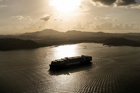A cargo ship transits the Panama Canal in Panama City, Thursday, March 12, 2026.