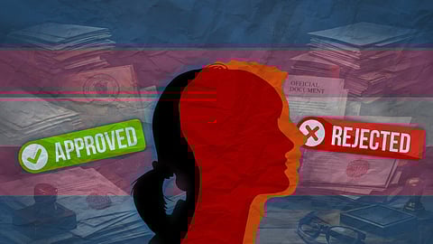 Illustration of overlapping silhouettes of a person against transgender flag colors with stacks of official documents in the background and “Approved” and “Rejected” stamps.