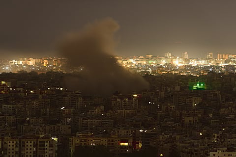 Smoke rises from the site of an Israeli airstrike in Dahiyeh, Beirut's southern suburbs, Monday, March 23, 2026.