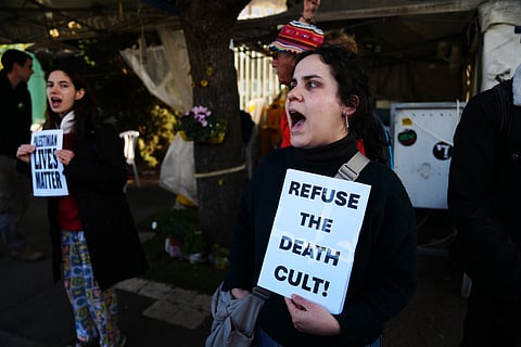 People protest against the decision by Israel's parliament to approve the death penalty for Palestinians convicted of murdering Israelis, in Jerusalem Tuesday, March 31, 2026. (AP Photo/Mahmoud Illean)