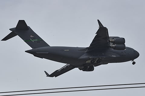 A U.S. Air Force Boeing C-17 Globemaster III transport aircraft prepares to land at Nur Khan airbase, ahead of second round of negotiations between the U.S. and Iran, in Rawalpindi, Pakistan, Monday, April 20, 2026. (AP Photo/Ehsan Shahzad)
