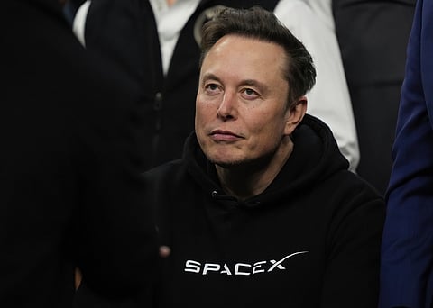 FILE - Elon Musk attends the finals for the NCAA wrestling championship, March 22, 2025, in Philadelphia. (AP Photo/Matt Rourke, File)