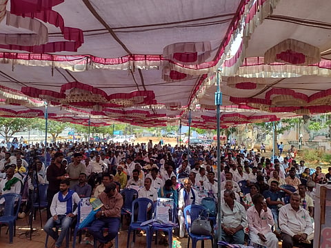 A large protest in Bengaluru demanding implementation of the PTCL Act.