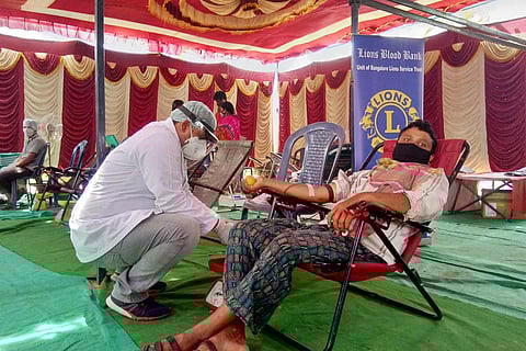 Unfazed by stigma, Bengaluru migrant labourers queue up to donate blood