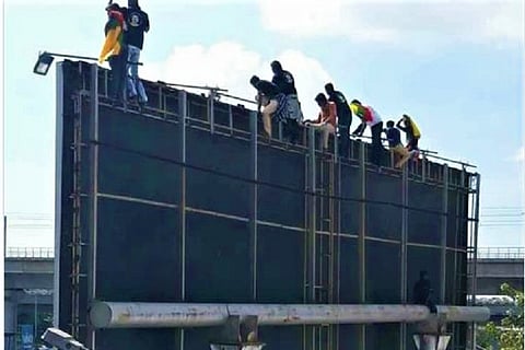 Black flags, balloons and daredevilry: Protesters hit the streets as Modi visits Chennai