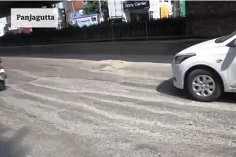 In 'Crater' Hyderabad, spot the road between the potholes