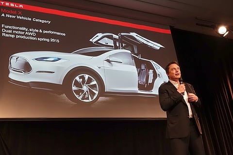 Elon Musk’s Tesla to remain public company after feedback from investors