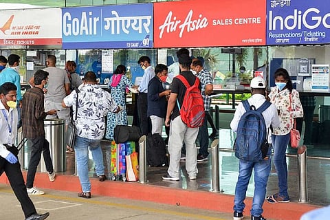 Passengers at ticket counters