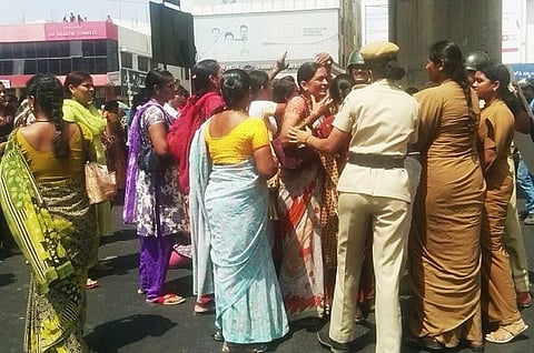 Garment workers block major Bengaluru roads for second day, police use tear gas on unruly protesters