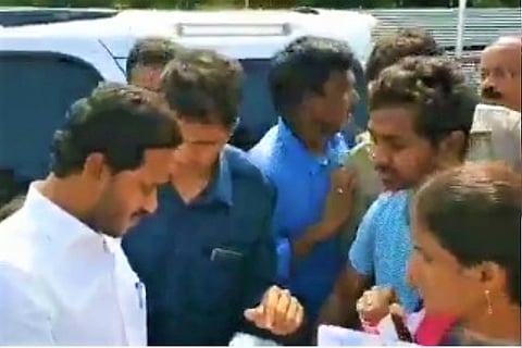 Cancer patient's friends hold placards on road, CM Jagan stops convoy to help them
