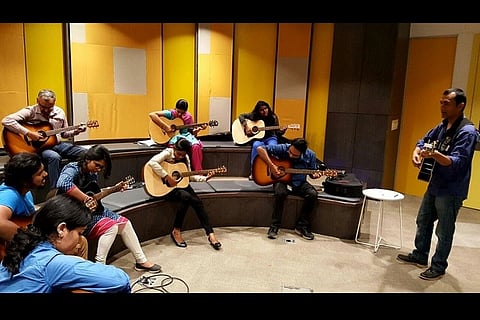 One note at a time: How a lawyer turned musician is helping Bengaluru’s corporate workers de-stress