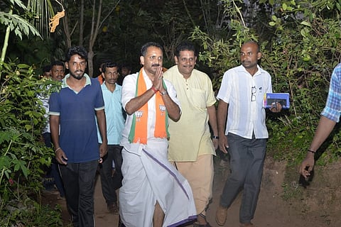 Surendran with other BJP members campaigning during election