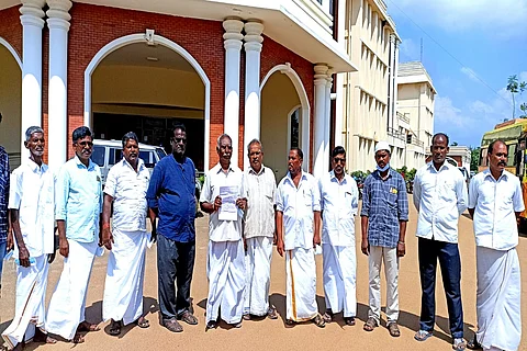 Residents of Michaelpatti village in front of collectorate