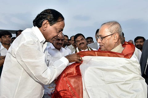 Telangana CM KCR felicitating Pranab Mukherjee when he visited Telangana as the President