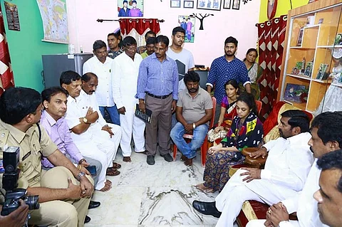 Telangana Min meets caste killing victim Pranay's kin, assures govt job to Amrutha