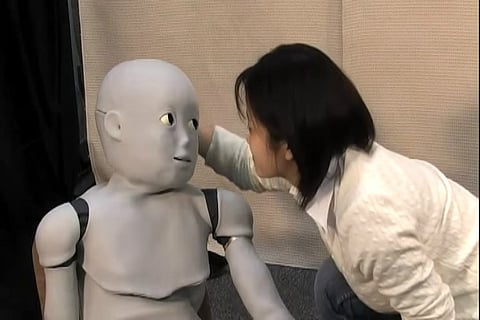 Japan's robot babies raise questions about how parents bond with Artificial Intelligence