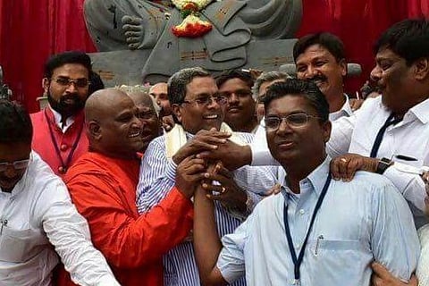 'Shake hands and bury past differences': K'taka CM attempts to unite feuding Jarkiholi brothers