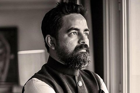 Fashion designer SABYASACHI MUKHERJEE wearing a sleeveless jacket