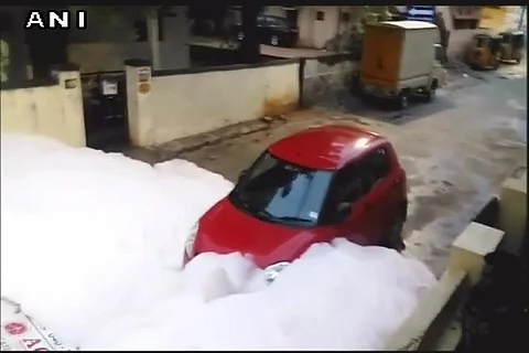 Watch: Toxic chemical froth mixed with rainwater engulfs road in Hyderabad residential area