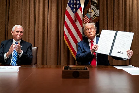 Donald Trump signing the executive order