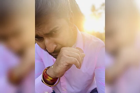 Actor Nani is seen wearing a white shirt in the close- up selfie.