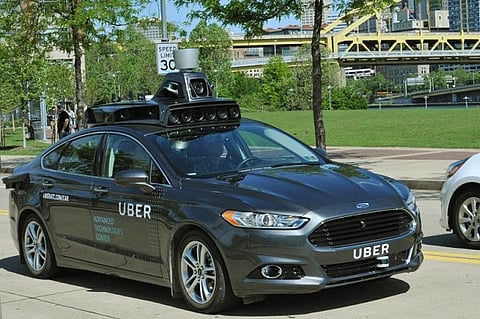 Uber's self-driving unit raises $1 billion from SoftBank, Toyota and Denso
