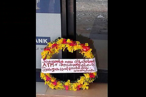 Humour in times of crisis: Kerala residents mourn the untimely death of a cashless ATM