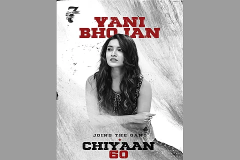 Vani Bhojan is seen in the poster released by the makers of 'Chiyaan60' to welcome her to the cast.