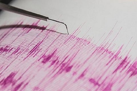 Earthquake being recorded in a richter scale