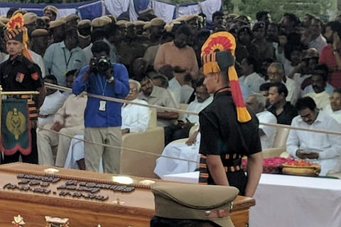 In the company of Anna, Kalaignar laid to rest at Marina