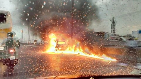 Car catches fire on busy Bengaluru flyover, chokes traffic