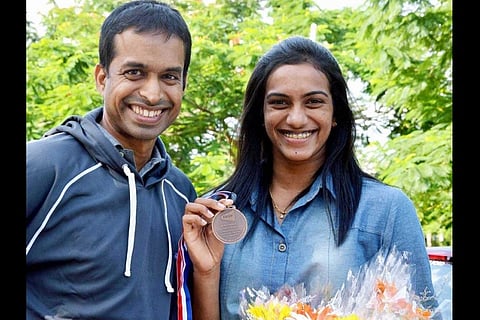 Gopichand, Sindhu enjoy NTR’s Janatha Garage