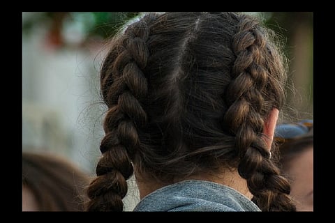 Kerala school girl shows us how it’s done: Hair plaiting can’t be made compulsory, says govt