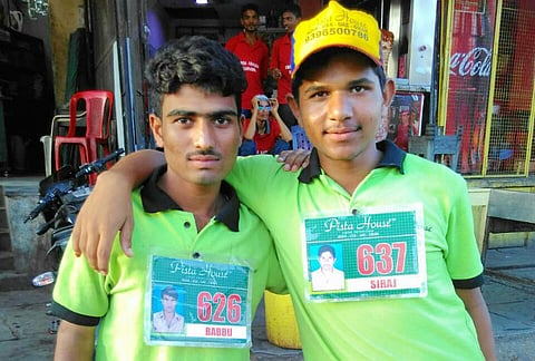 The young men have travelled hundreds of miles to serve you Hyderabadi Haleem