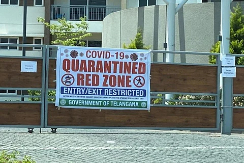 Banner outside gated community announcing containment zone in Telangana