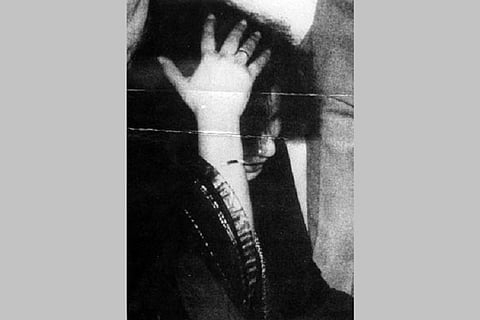 The iconic image of Jayalalithaa looking through her torn saree, photographer remembers