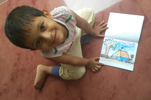 Jeevan with his sketchbook