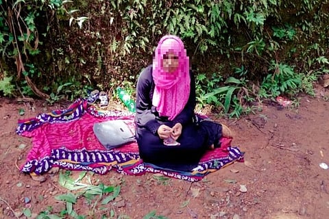 Kerala woman protests outside husband’s house accusing him of giving ‘triple talaq’