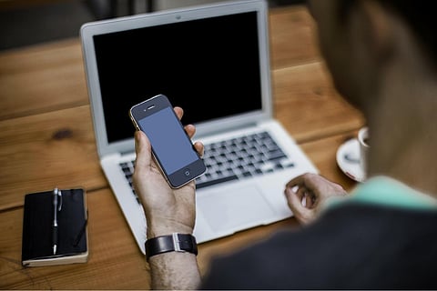 man using laptop