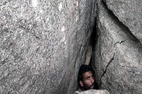 Raju struck between boulders